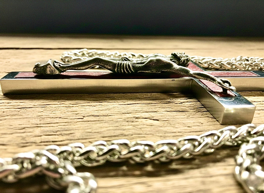 Crucifix cross pendant necklace in silver-tone metal with red inlay details