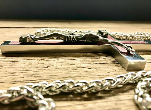 Crucifix cross pendant necklace in silver-tone metal with red inlay details