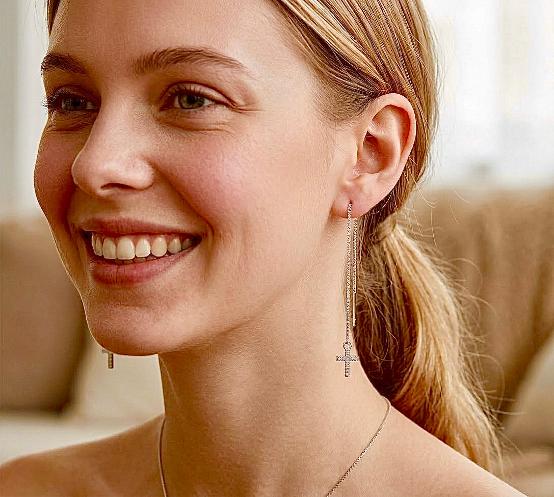 Silver cross chain earrings with box chain drop through the earlobe
