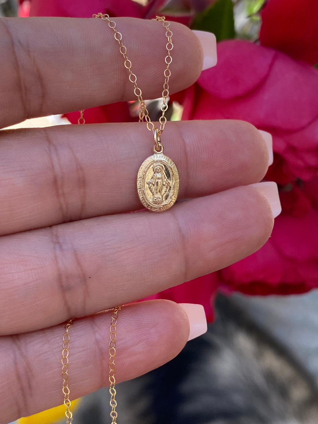 Gold-tone small-link chain necklace with round religious medal pendant