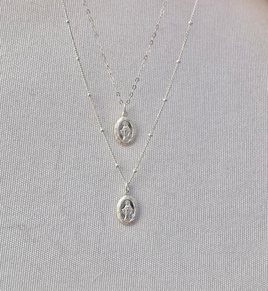 Silver miraculous medal necklace with two oval pendants on fine chain