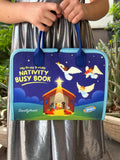 Children’s nativity busy book with blue cover and stitched handle pockets