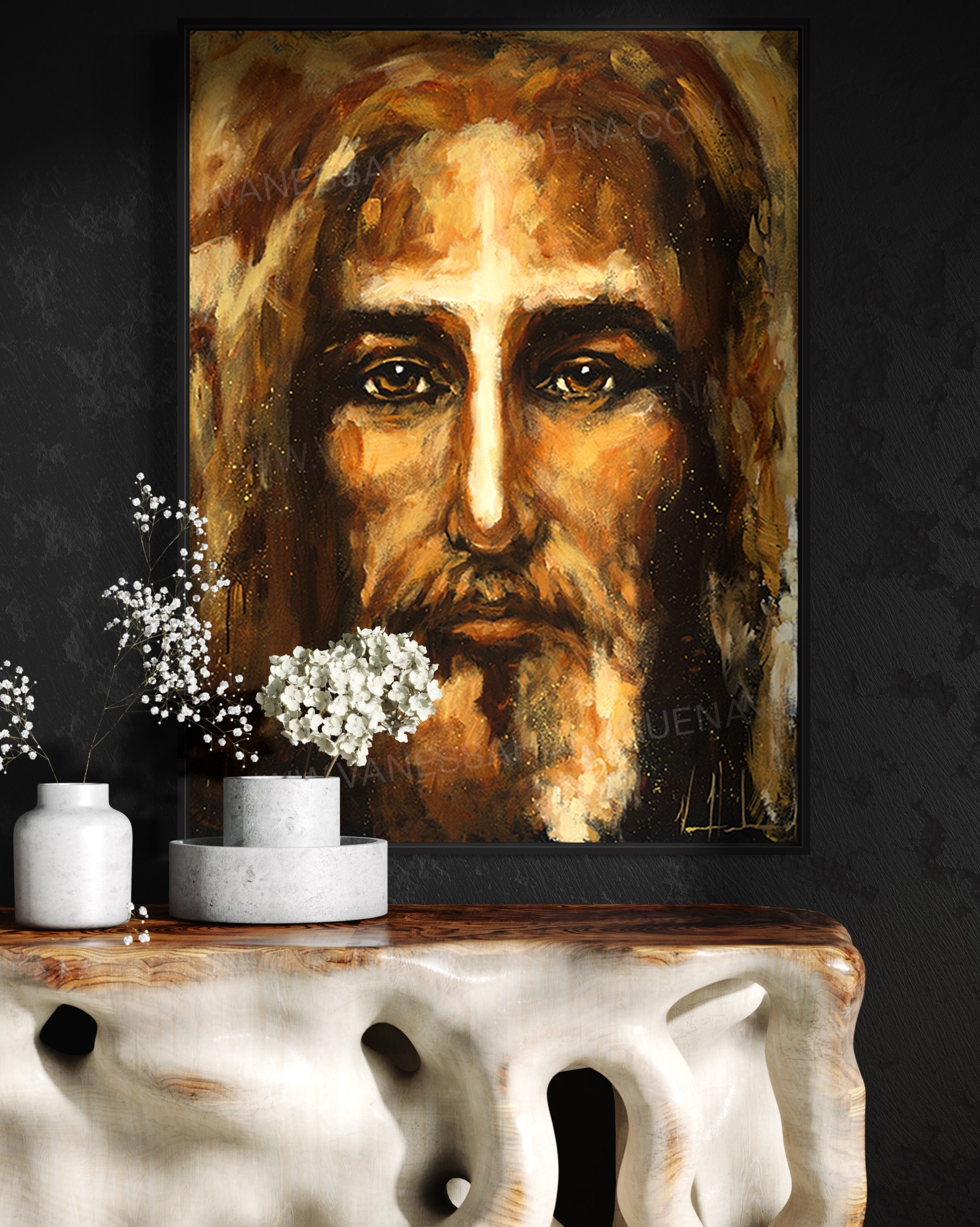 Large framed portrait artwork of a bearded man with a glowing cross-like light on his forehead