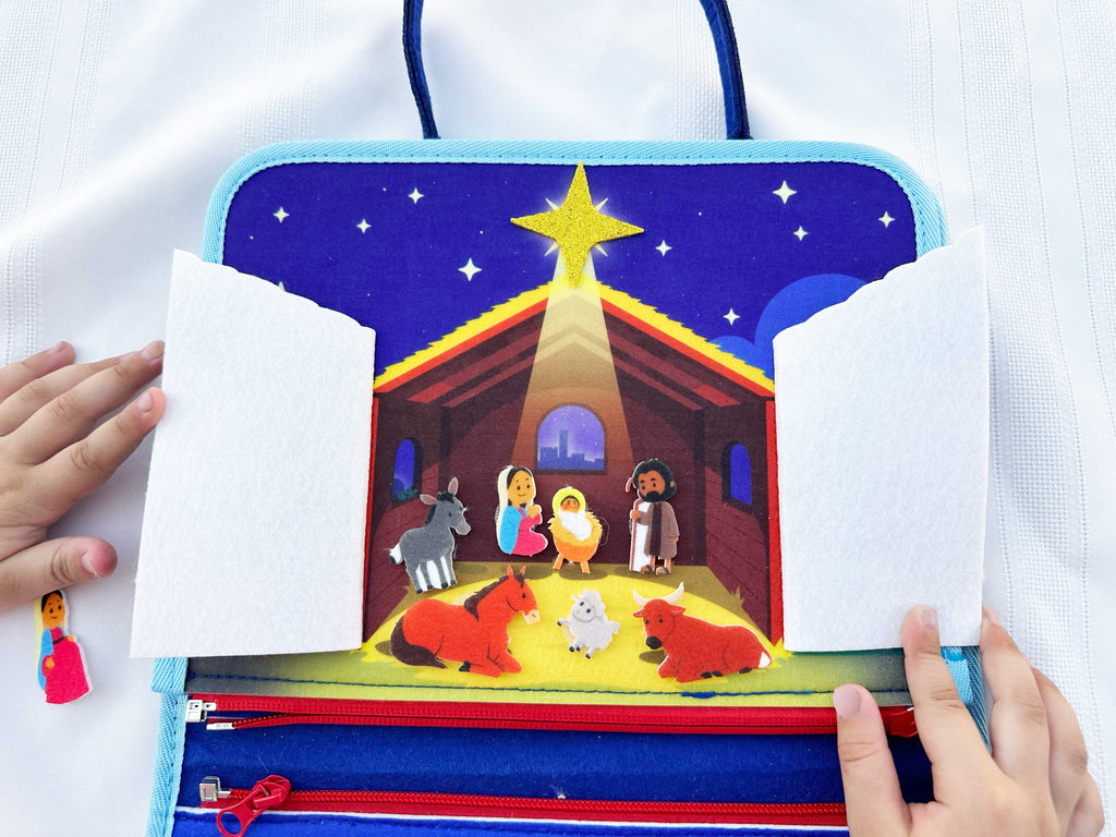 Nativity busy book closed cover with star on nativity barn scene and side pockets
