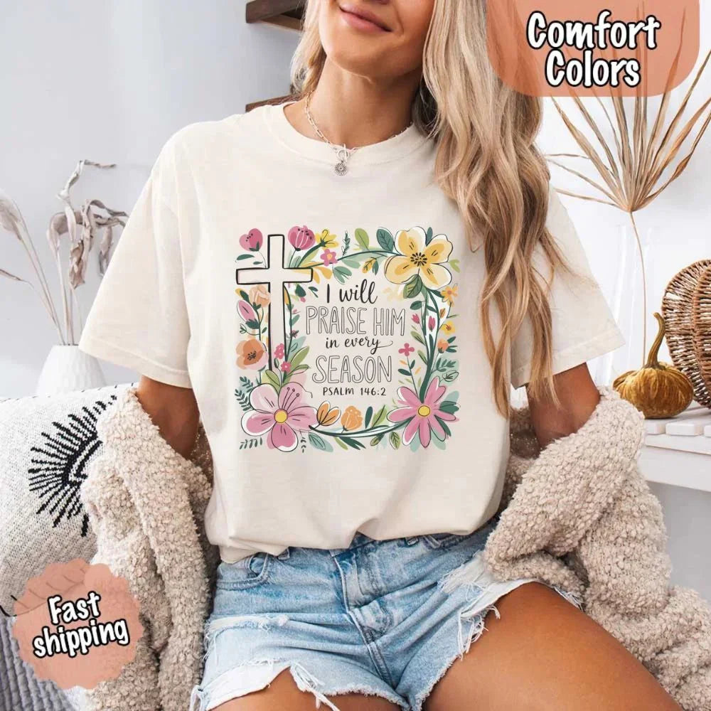 Ivory Comfort Colors crewneck tee with floral cross graphic and scripture text front