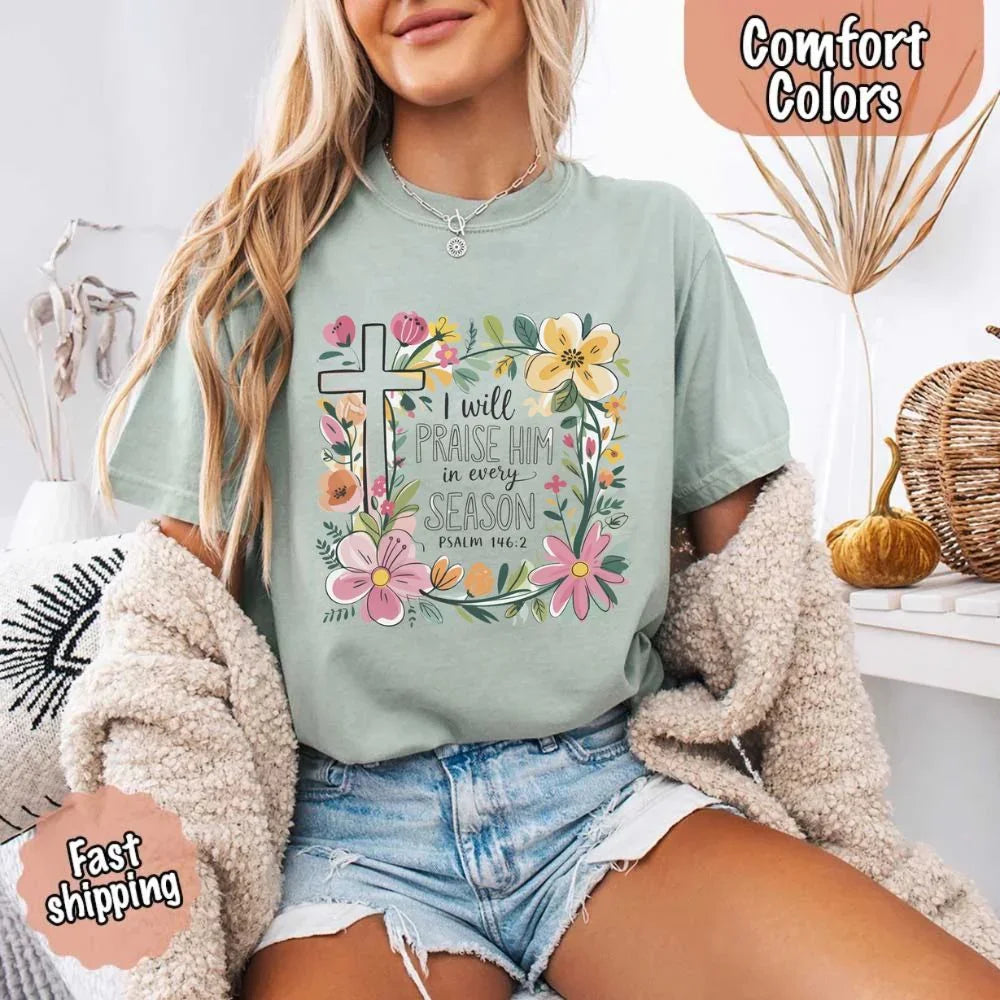 Sage green Comfort Colors crewneck tee with floral cross and scripture text graphic