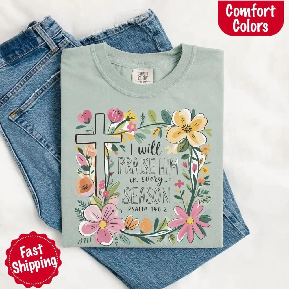 Mint crewneck tee with floral cross graphic and “I will praise Him in every season”
