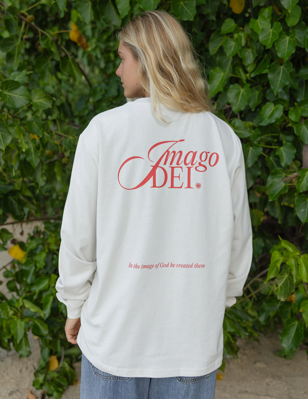 White long-sleeve unisex tee with large red back script logo