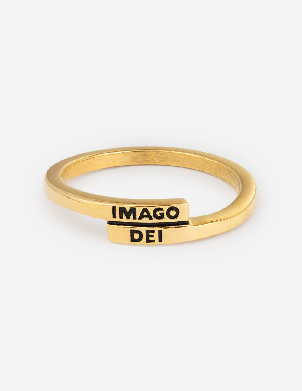 Gold ring with black IMAGO DEI lettering