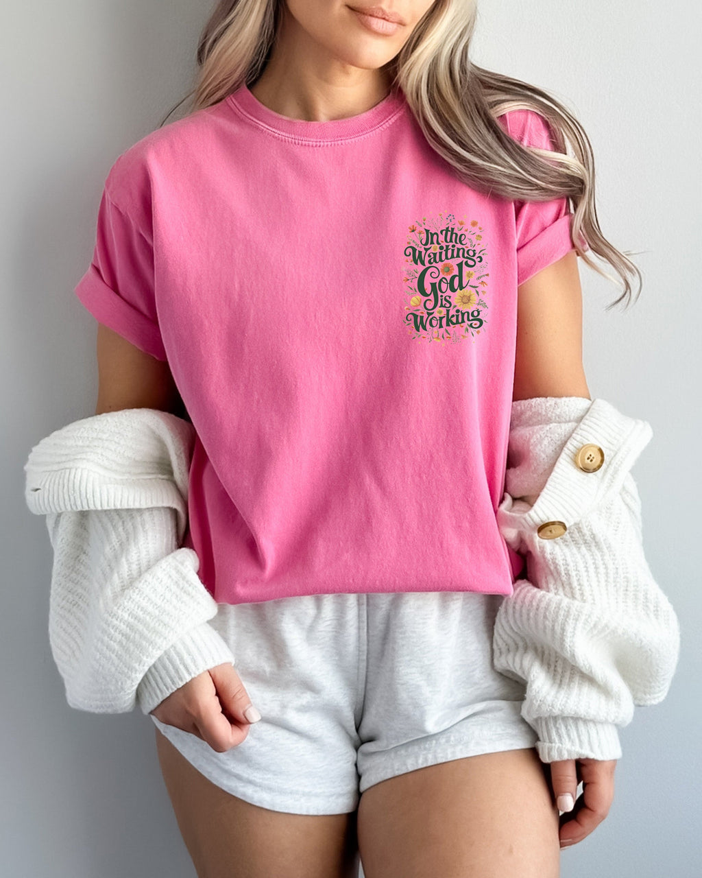 Berry pink T-shirt with 'In The Waiting God Is Working' graphic on left chest