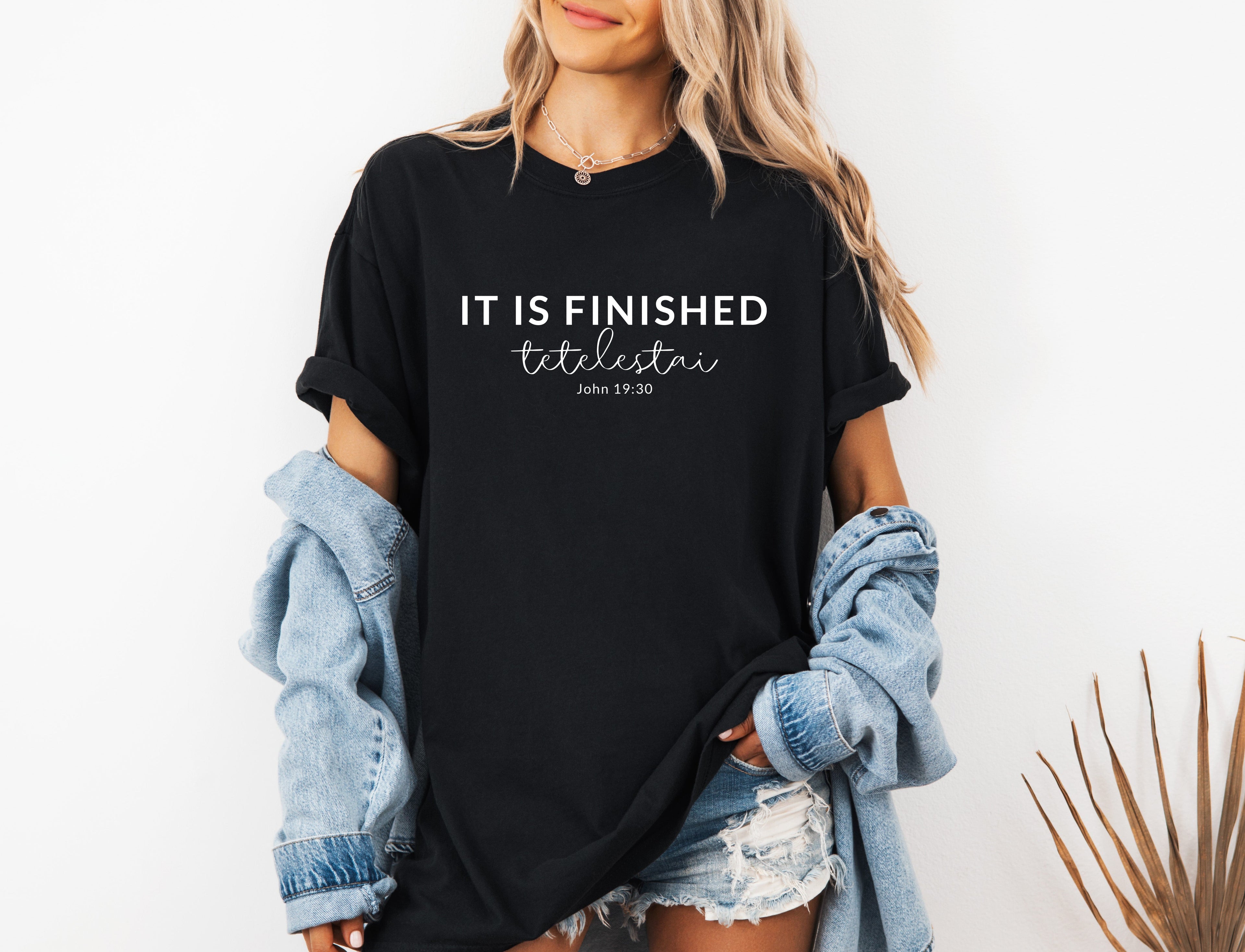Unisex T-shirt, black with “IT IS FINISHED” chest graphic and short sleeves