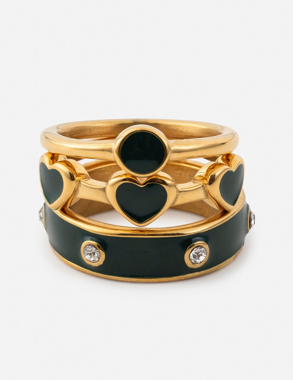Gold-tone ring set with heart and round green stones on dark enamel bands