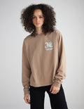 Long-sleeve heavyweight T-shirt in tan with small chest logo graphic