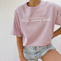 Light purple T-shirt with white 'He is coming back' script on the front