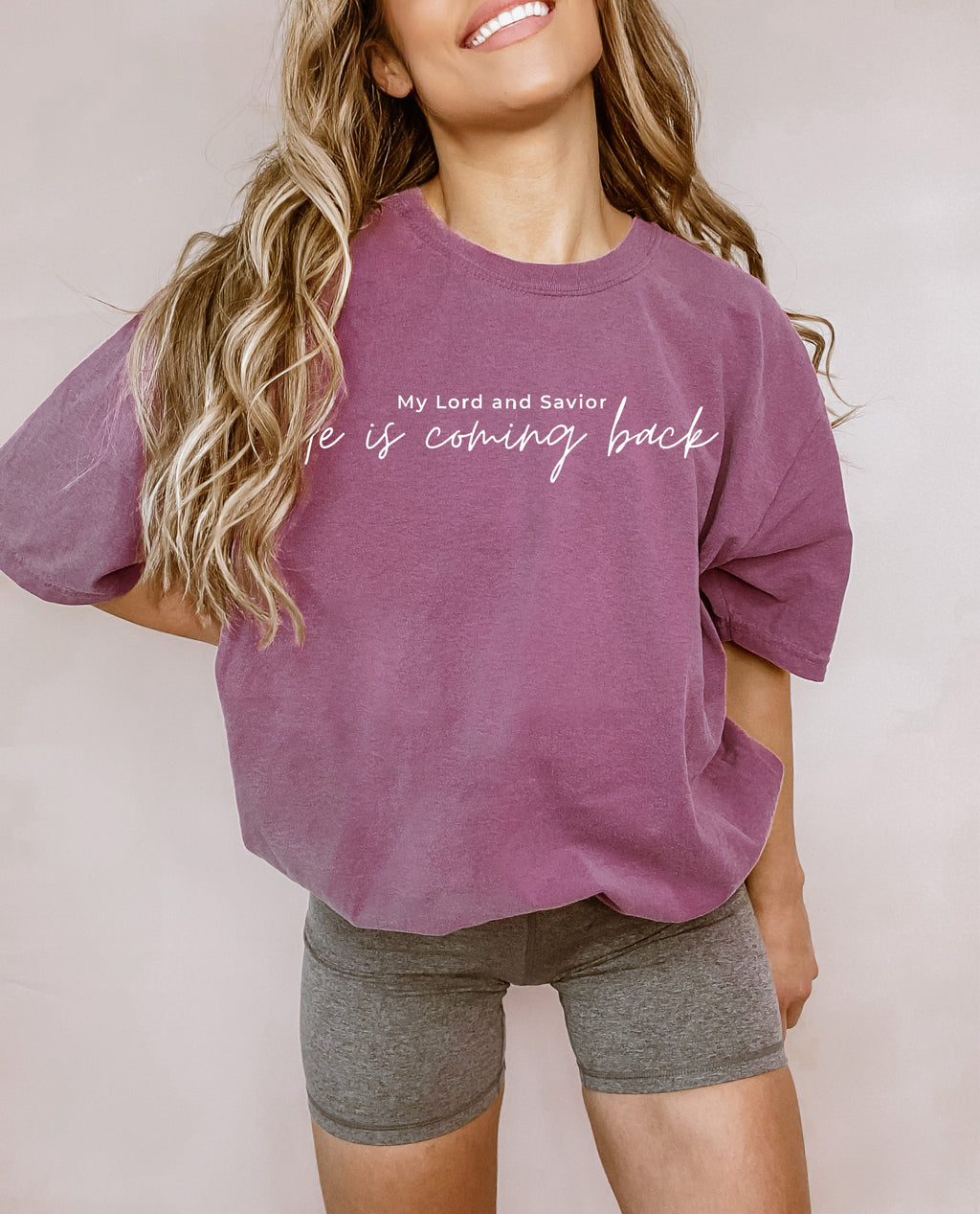 Dusty purple unisex t-shirt with script “He is coming back” and “My Lord and Savior” above