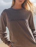 Brown long-sleeve unisex T-shirt with “JESUS IS KING” chest print, crew neck