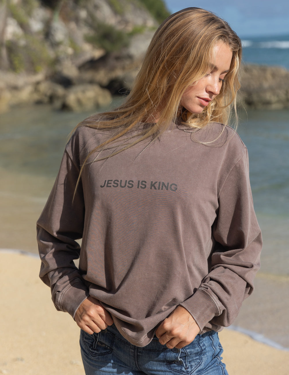 Brown long-sleeve unisex T-shirt with “JESUS IS KING” back print, crew neck