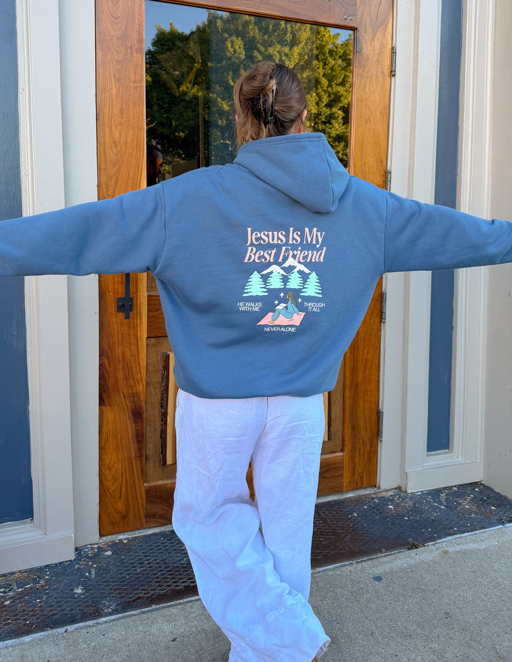 Blue unisex hoodie with "Jesus Is My Best Friend" graphic on back, hood down