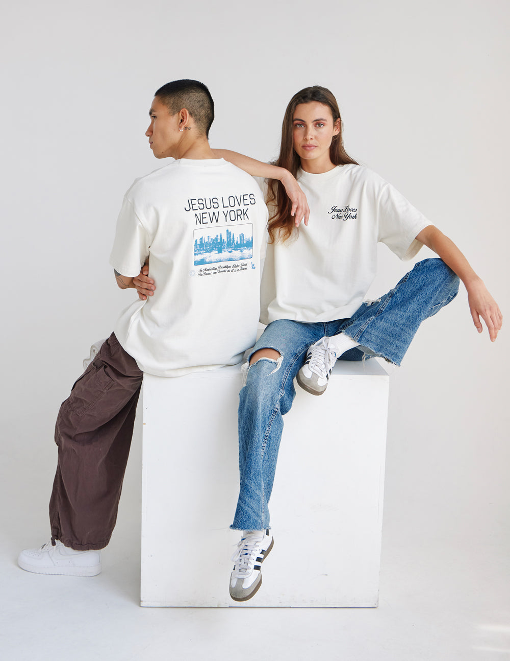 White heavyweight T-shirt with back “JESUS LOVES NEW YORK” print and skyline