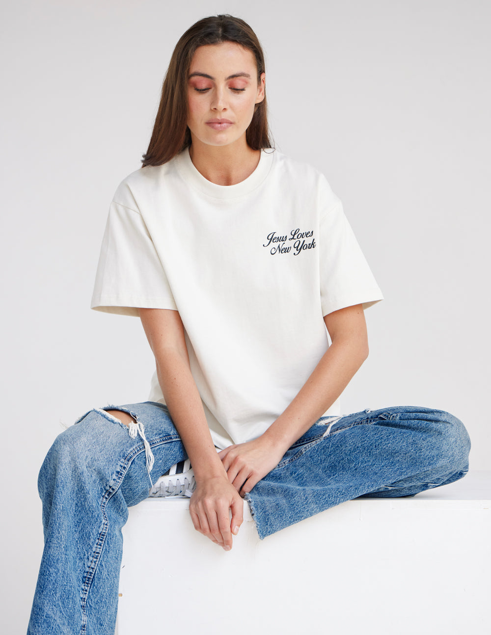 White heavyweight T-shirt with small chest script logo