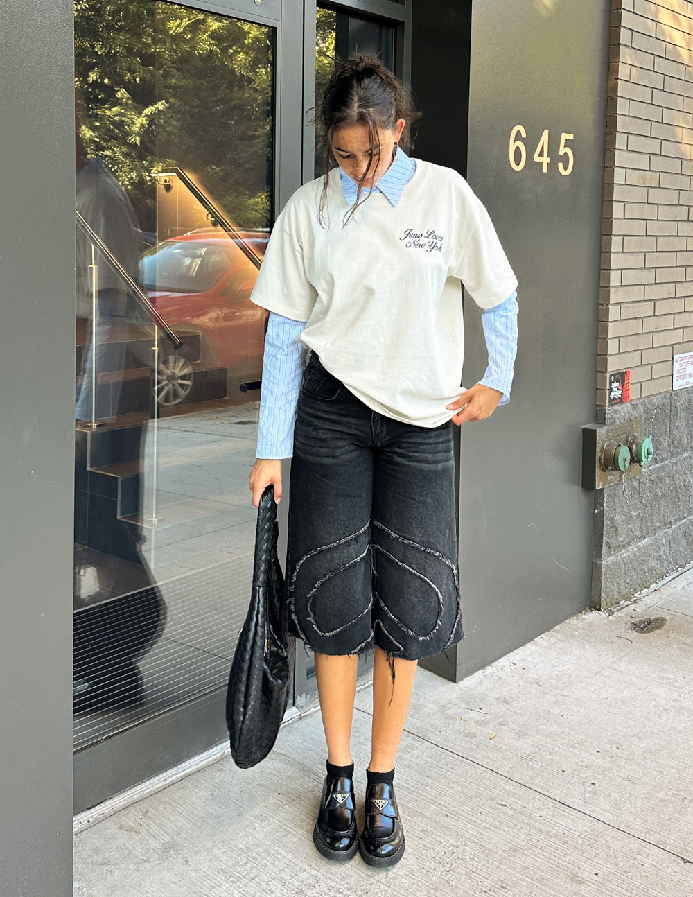 White heavyweight T-shirt with small chest script logo and relaxed fit