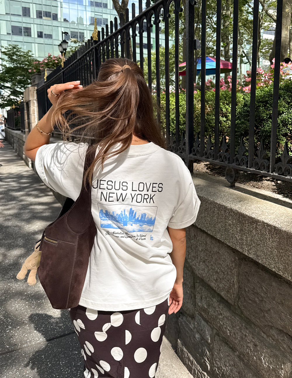 White heavyweight T-shirt with back “JESUS LOVES NEW YORK” print and skyline