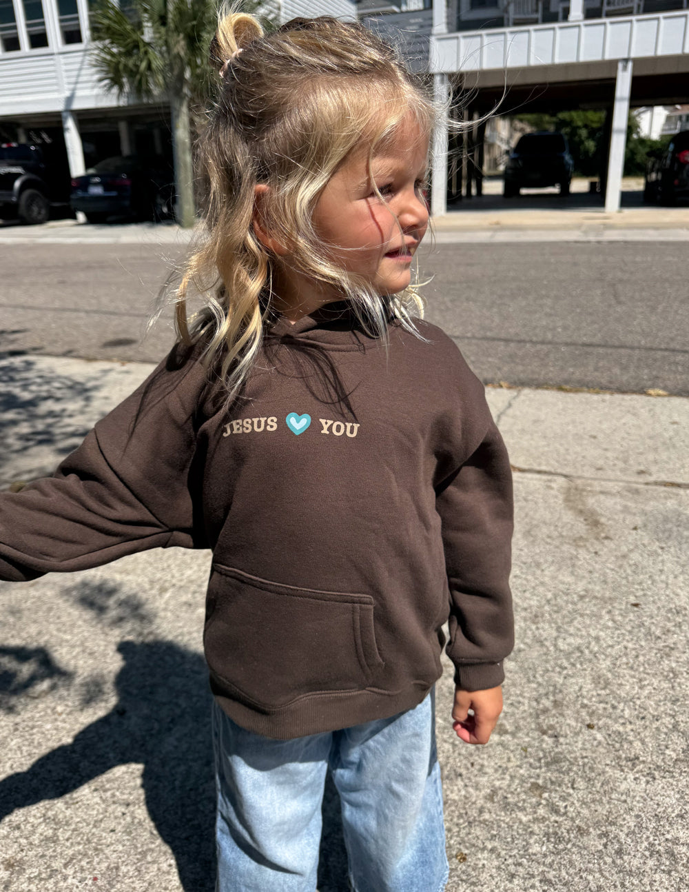 Kids dark brown hooded sweatshirt with “JESUS YOU” chest text and front pocket