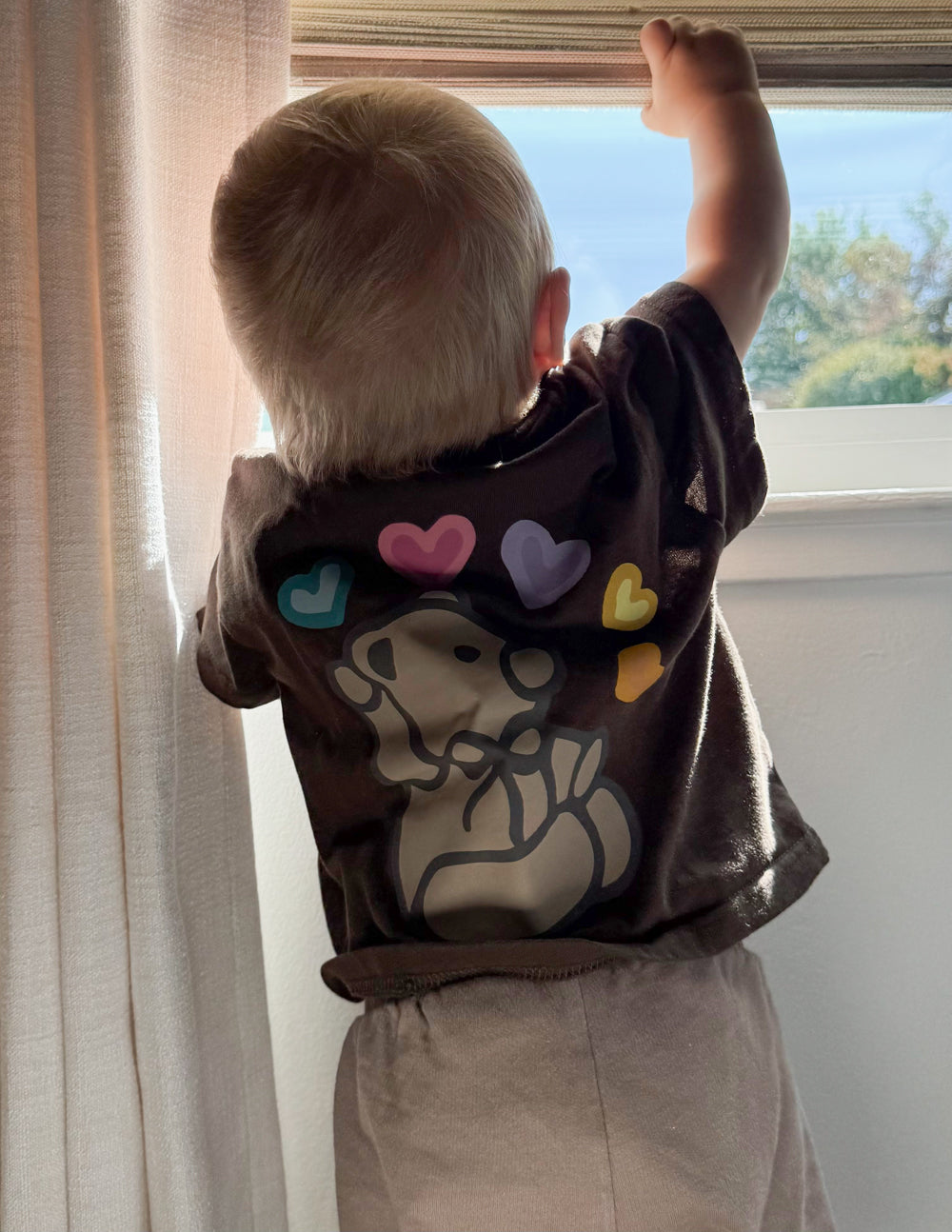 Kids brown T-shirt with colorful hearts and dog graphic on back