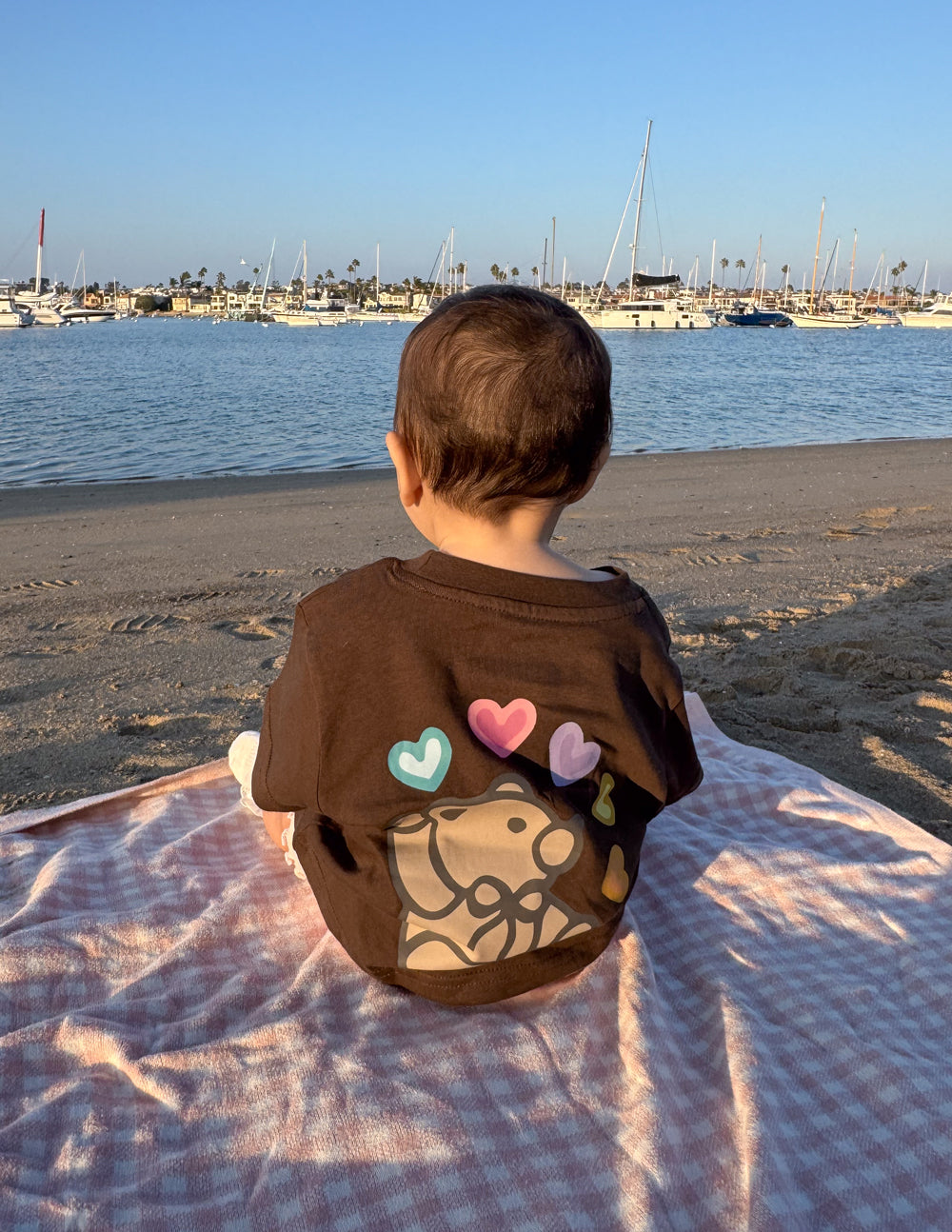 Kids brown T-shirt with colorful hearts and dog graphic on the back