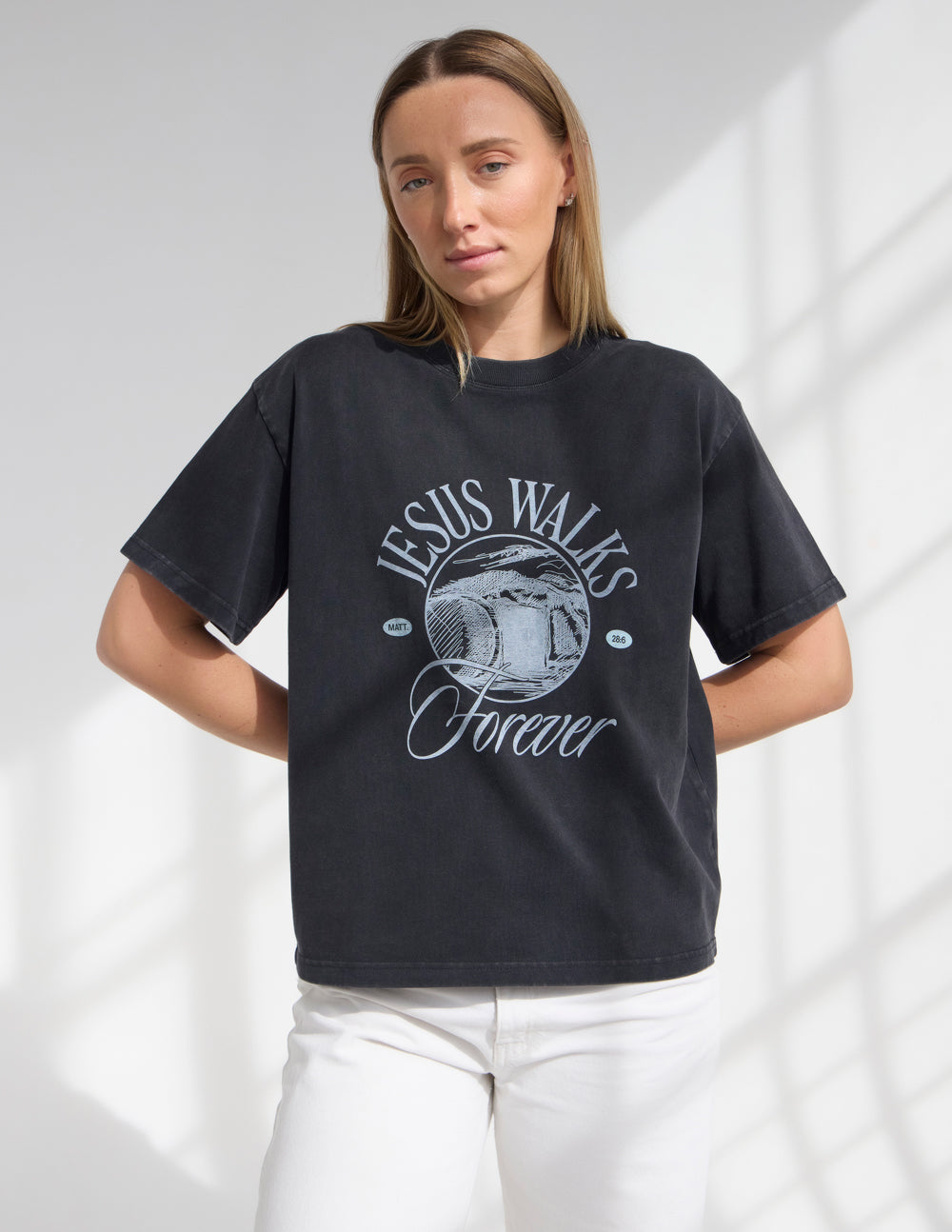 Black heavyweight crewneck tee with 'Jesus Walks Forever' center chest graphic