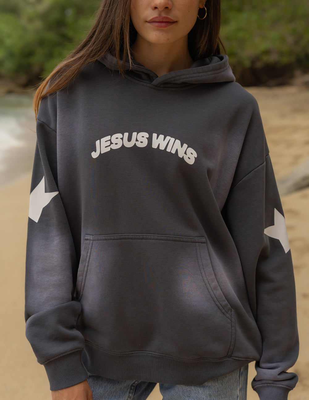 Dark gray unisex hoodie with hood, front pocket, and “JESUS WINS” chest logo