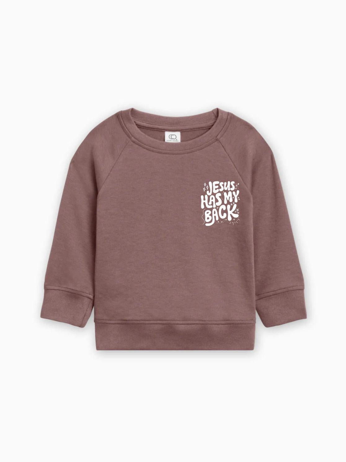 Toddler pullover sweatshirt in cocoa brown with "Jesus has my back" graphic front