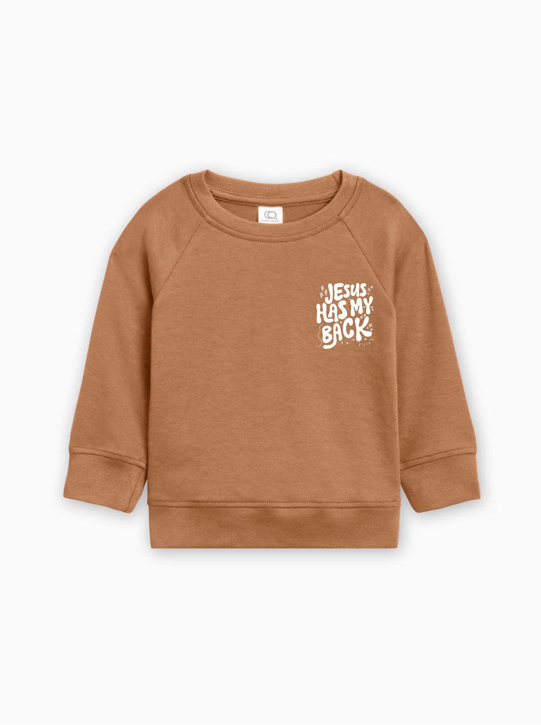 Toddler pullover sweatshirt in tan brown with "Jesus has my back" graphic