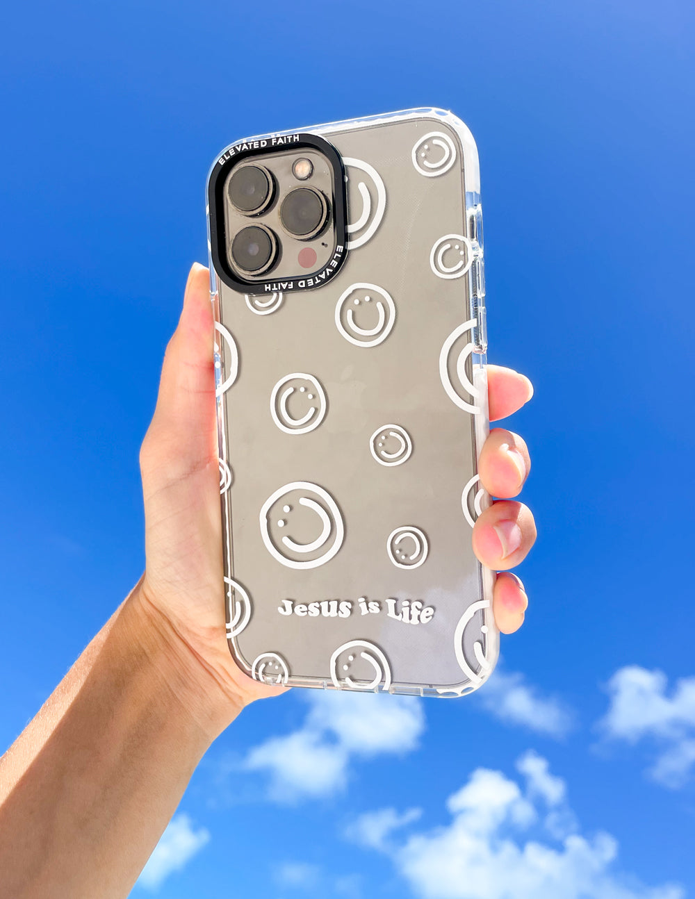 Clear white phone case with smiley icons and Jesus is Life text