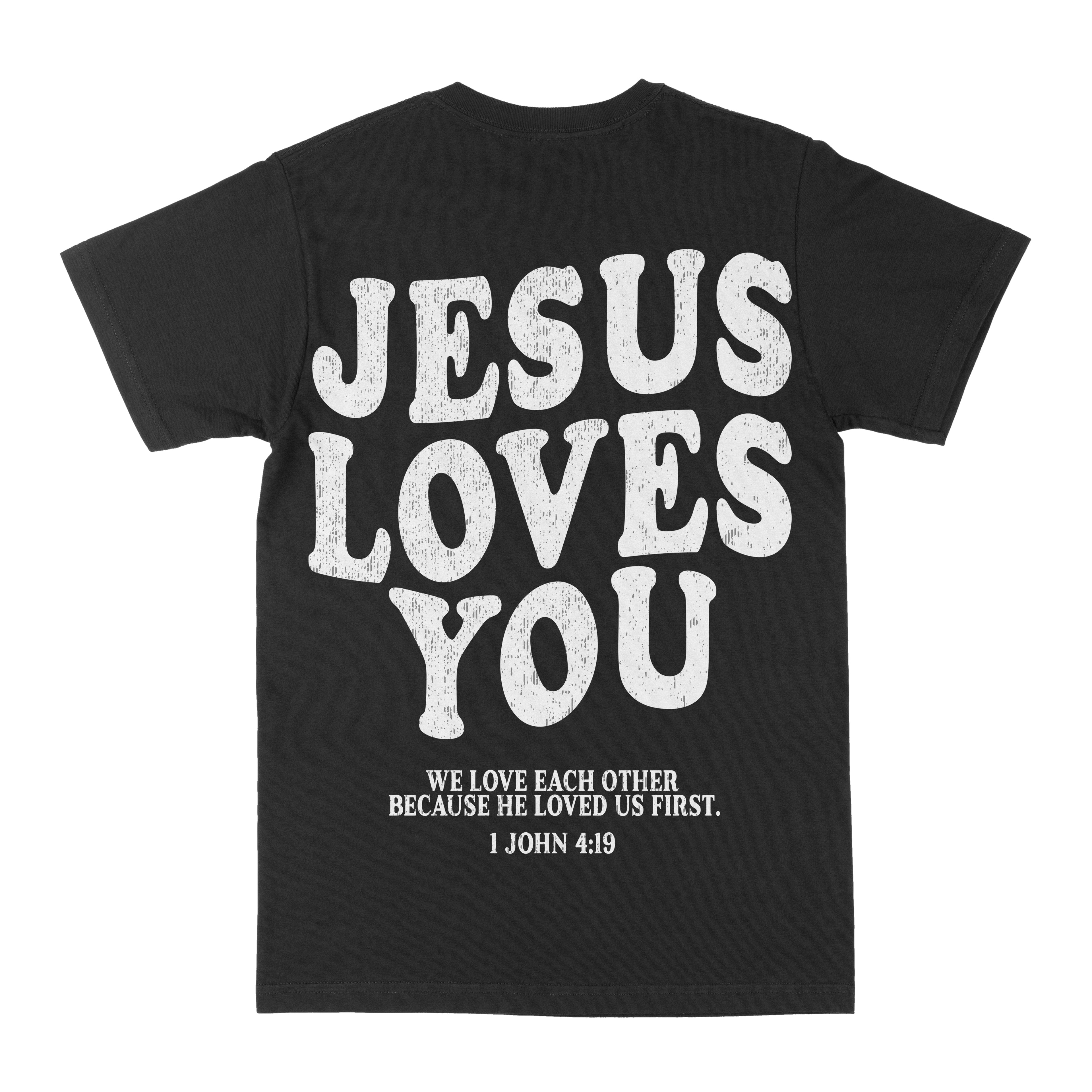 Black graphic crewneck tee with large distressed "JESUS LOVES YOU" and verse text
