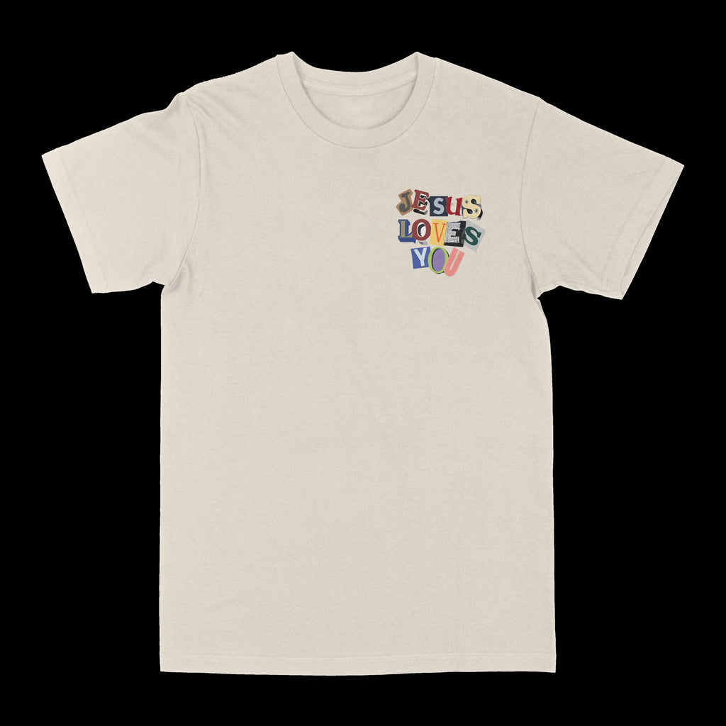 Cream graphic T-shirt with small centered 'Jesus Loves You' print