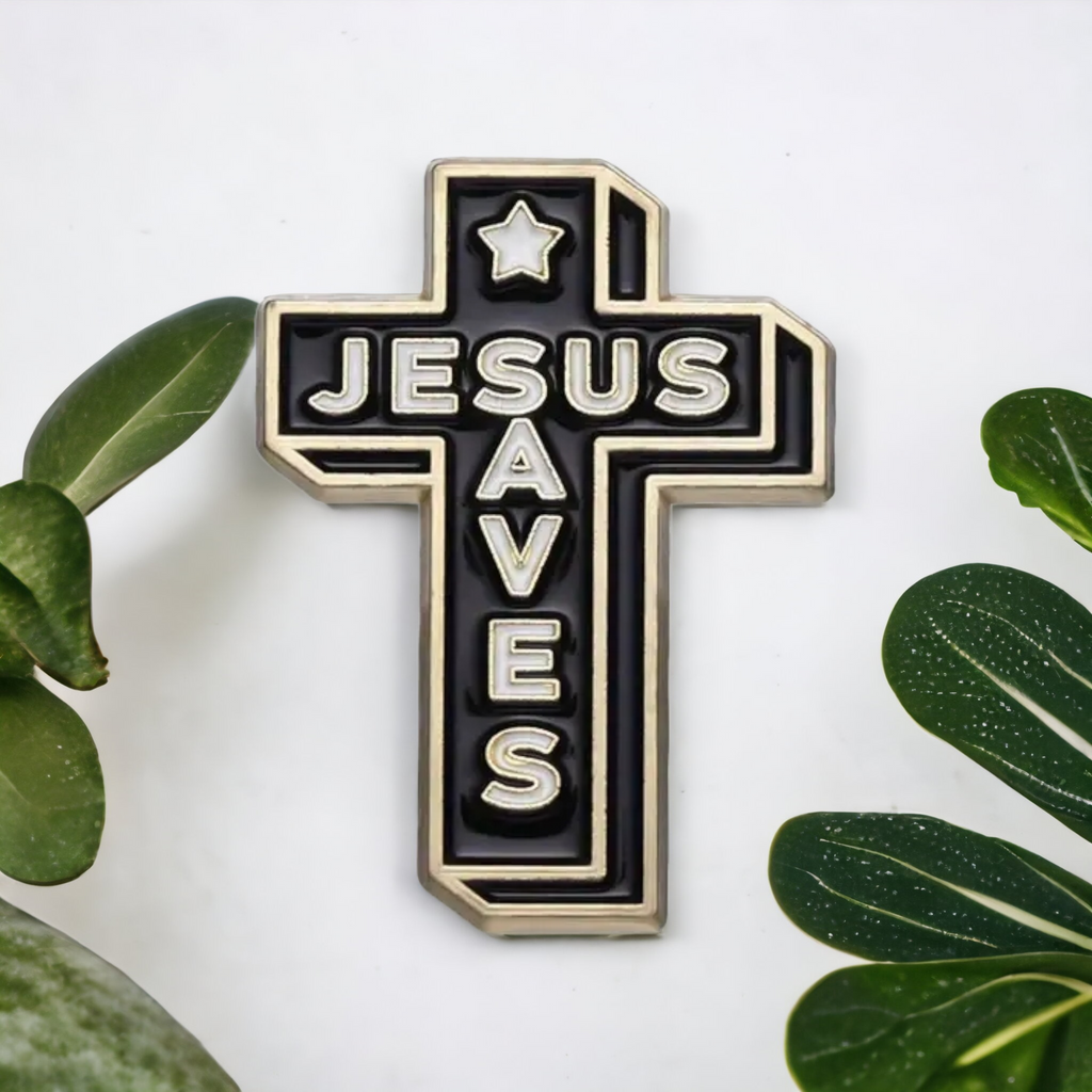 Cross enamel pin, black with gold trim, star and “JESUS SAVES” lettering