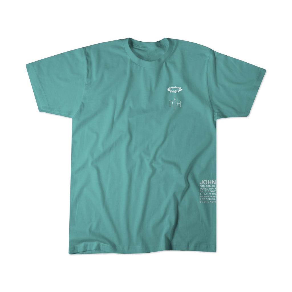 Seafoam premium T-shirt, flat lay, front with small chest emblem and vertical text