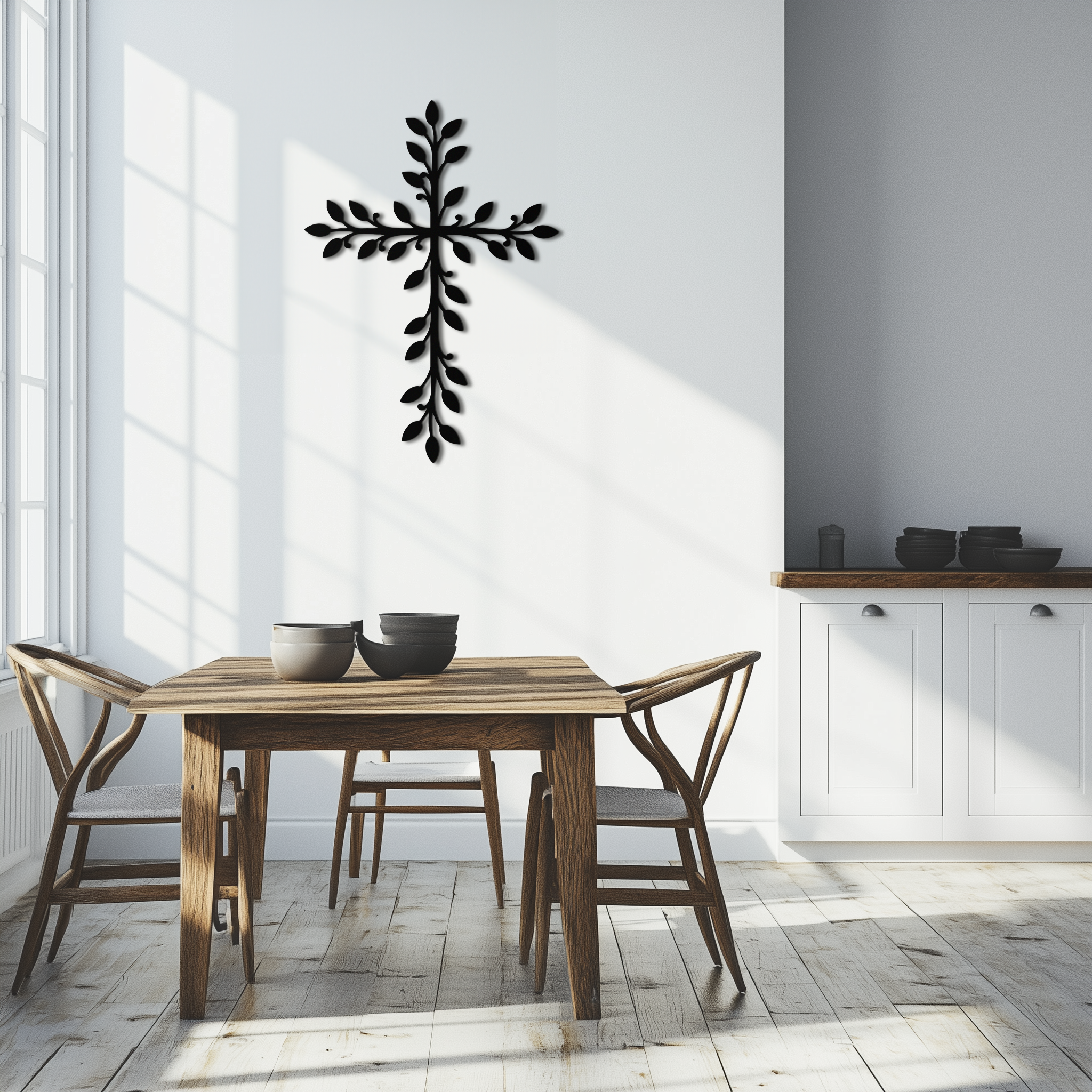 Leaf cross metal wall art with black leaf detailing on gray wall