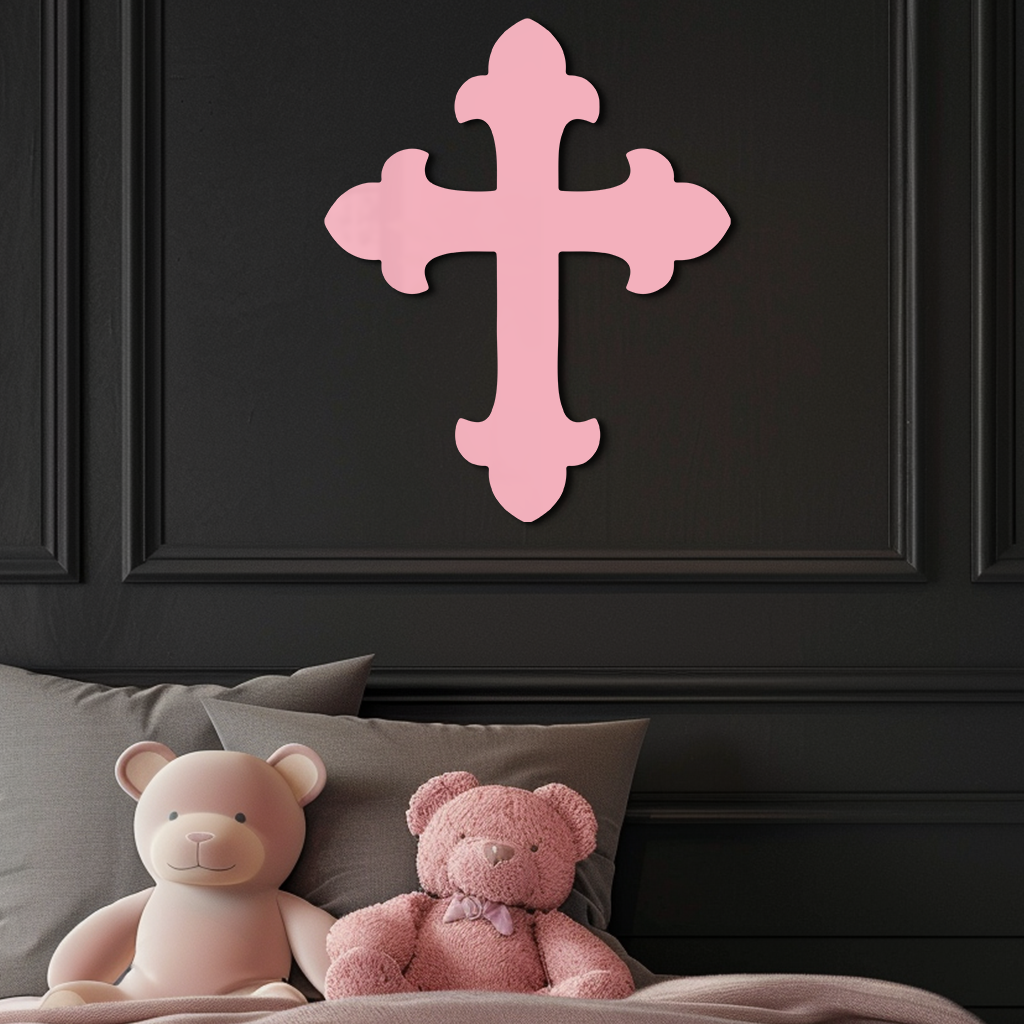 Pink metal cross wall art with rounded arms and raised vertical center