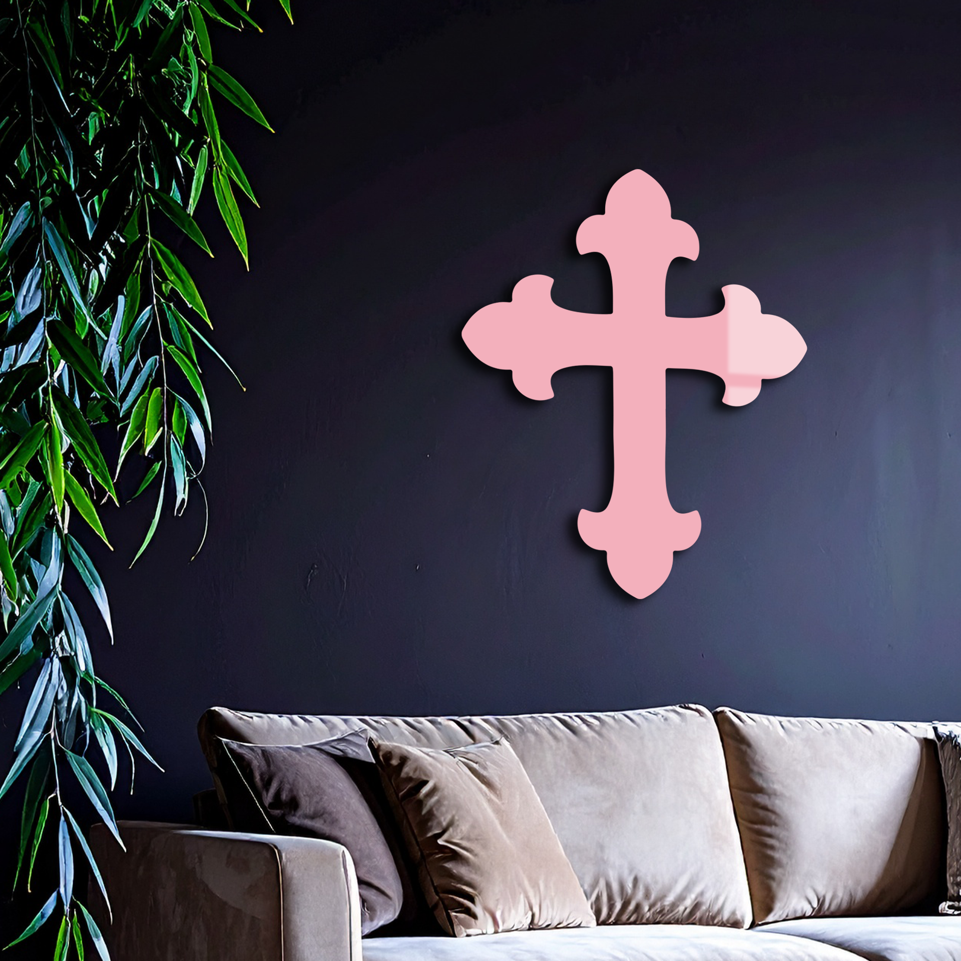 Pink metal cross wall art with rounded arms and vertical stem