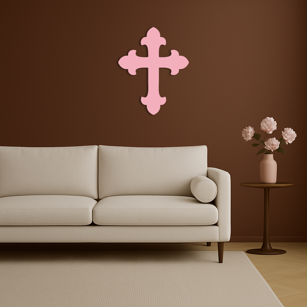 Pink metal cross wall art with rounded four-lobed arms and vertical center