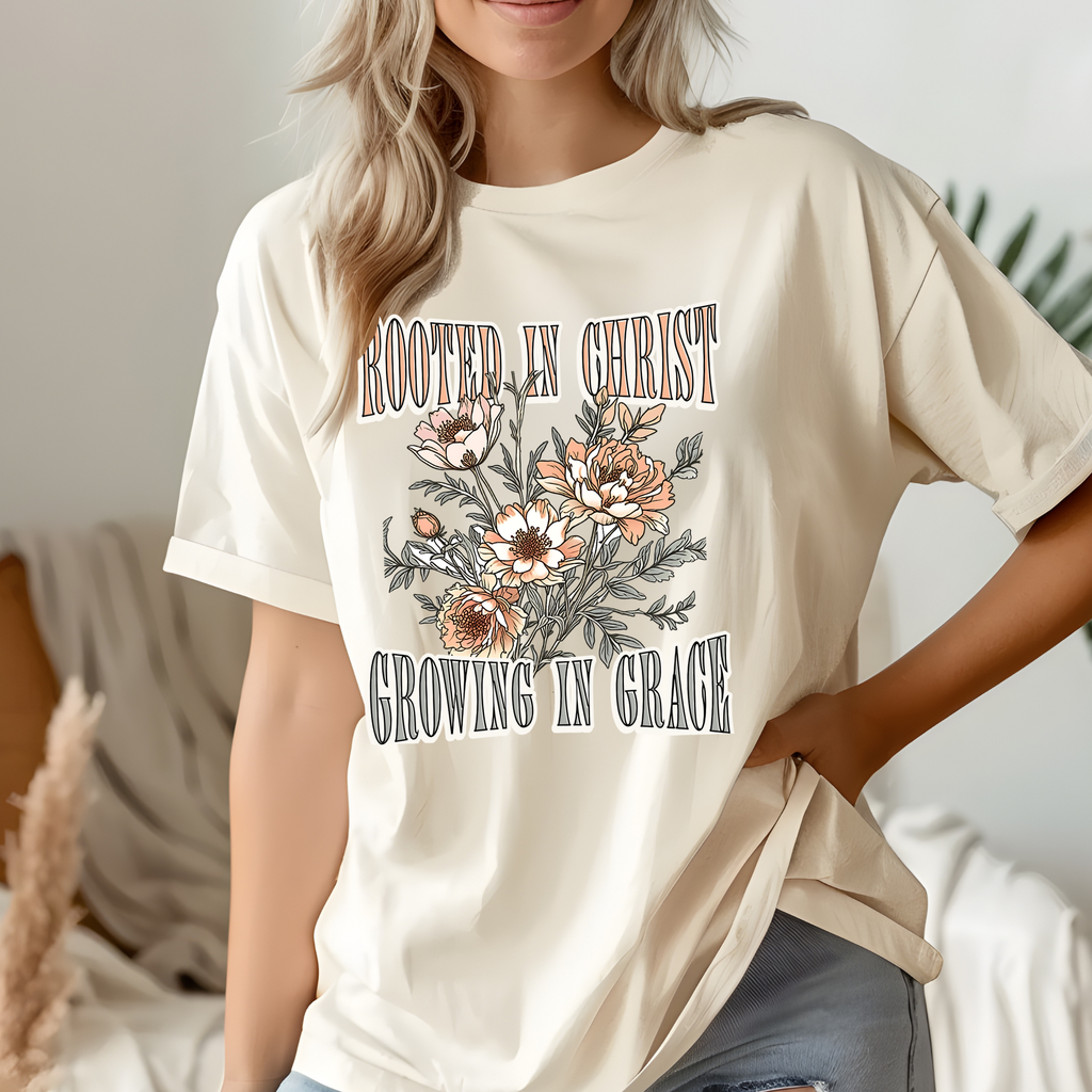 Cream crewneck T-shirt with floral 'Rooted in Christ' front graphic