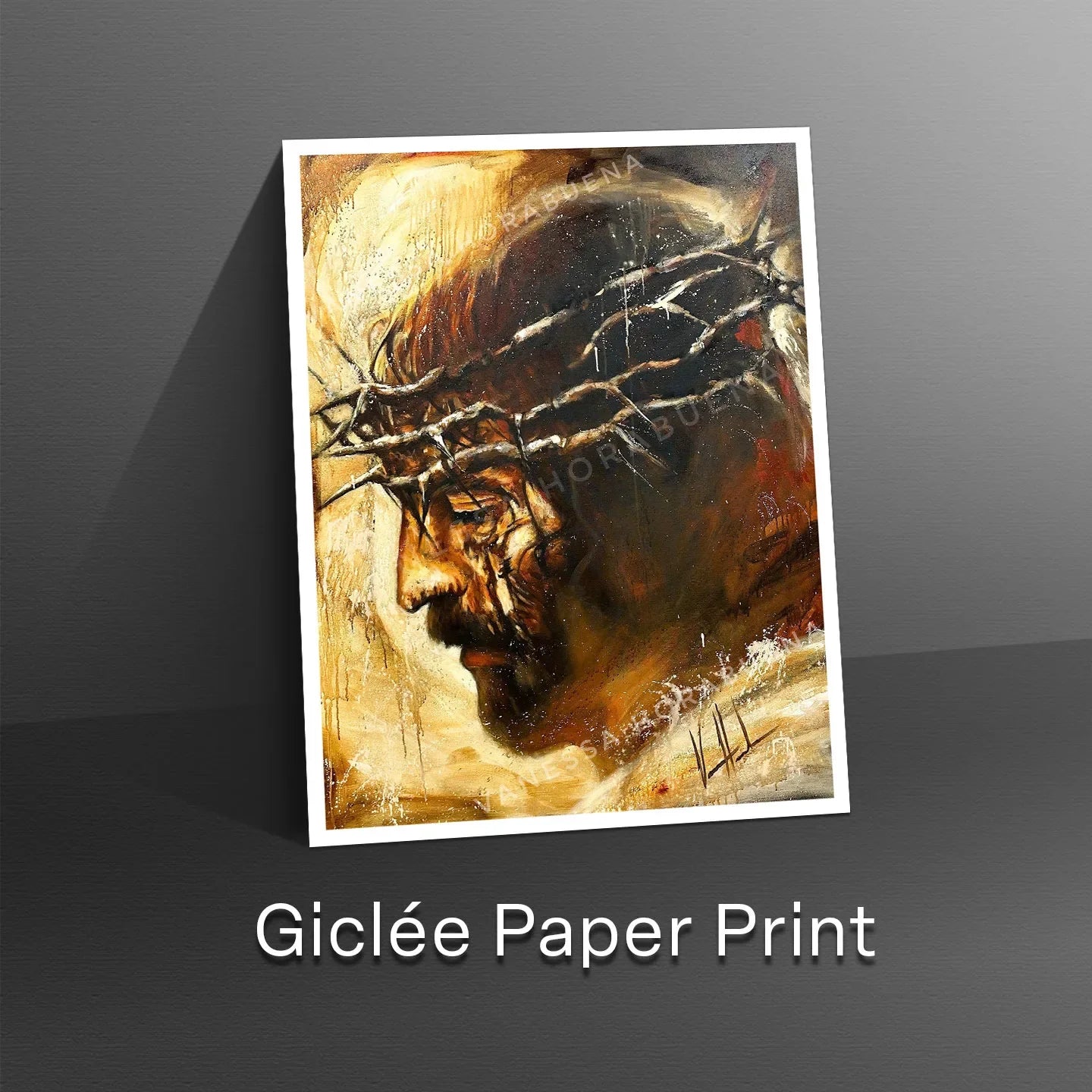 White-bordered wall print featuring a close-up male face in warm gold, brown, and black