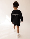 Kids black crewneck sweatshirt with back graphic print, long sleeves