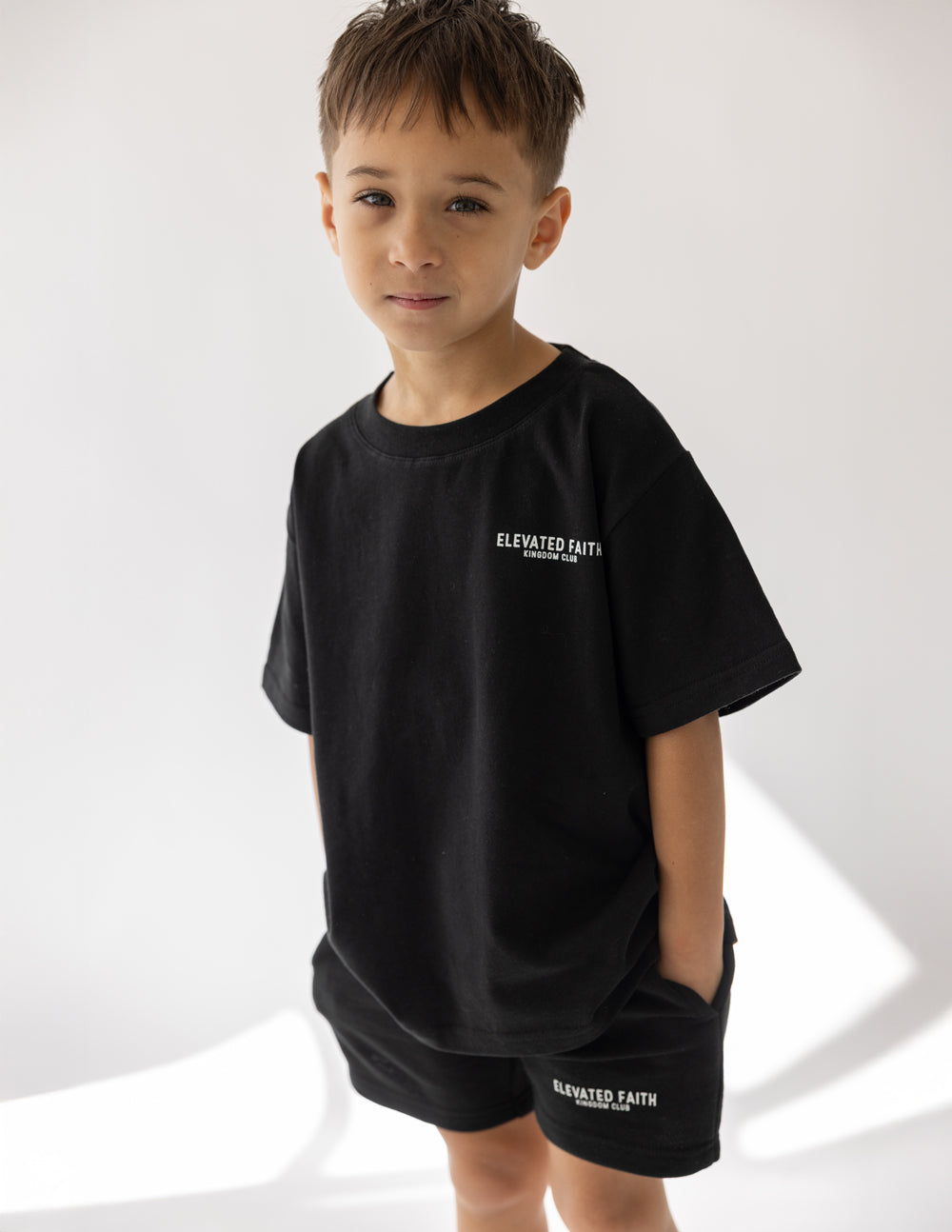 Kids black crew-neck t-shirt with small chest logo print