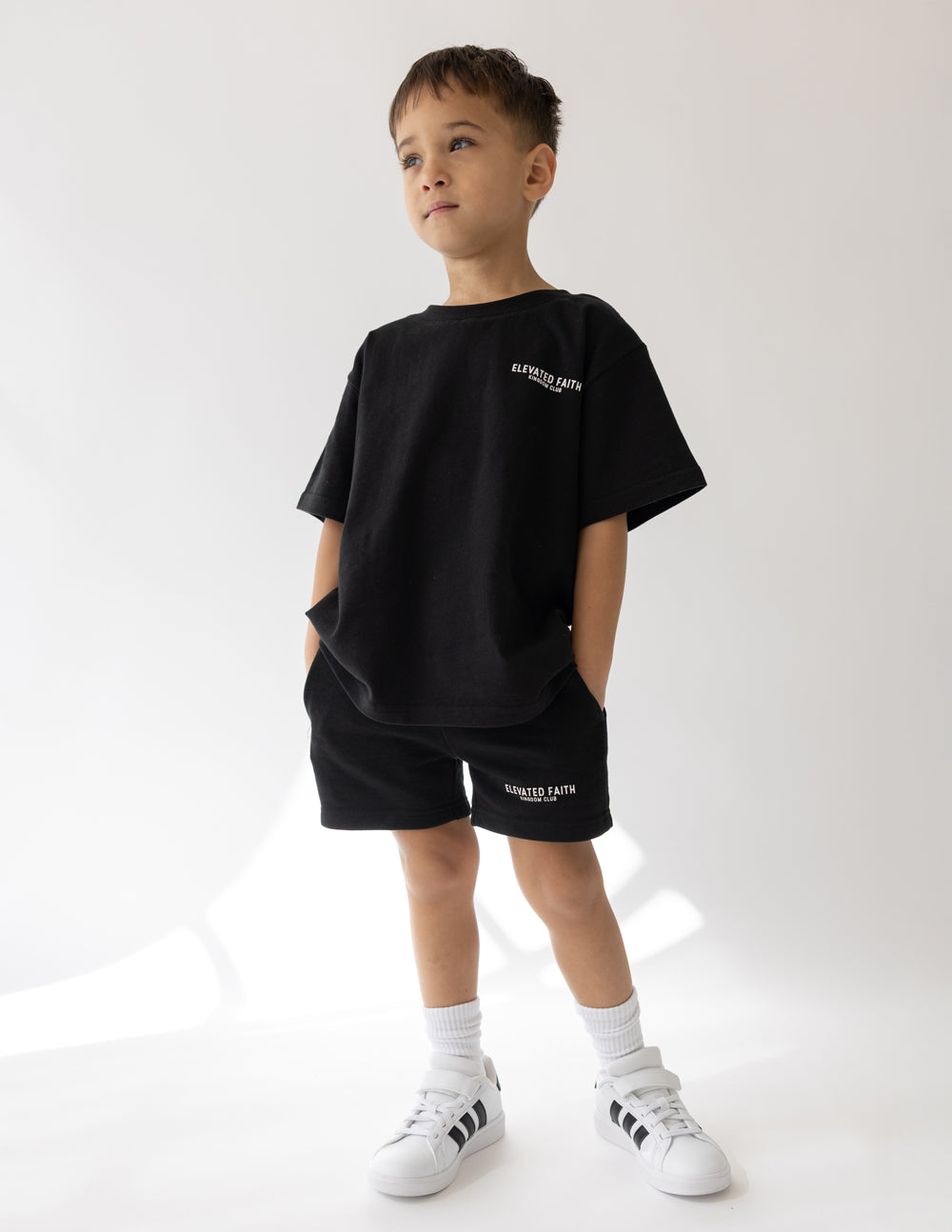 Kids black crew-neck t-shirt with small chest logo print