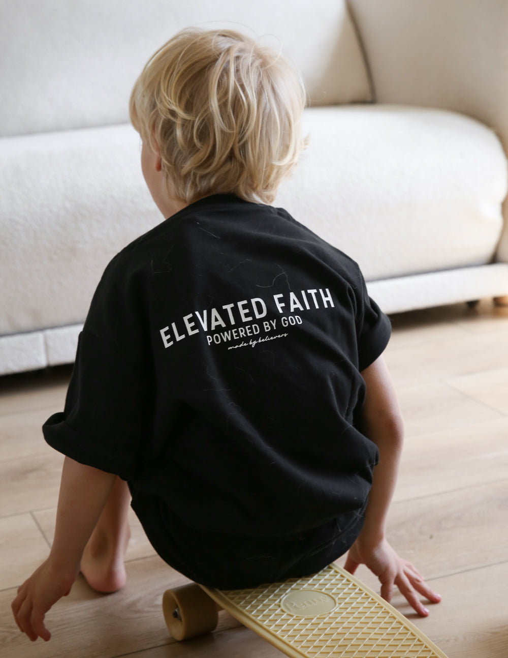 Kids black crew-neck t-shirt with back “Elevated Faith” print