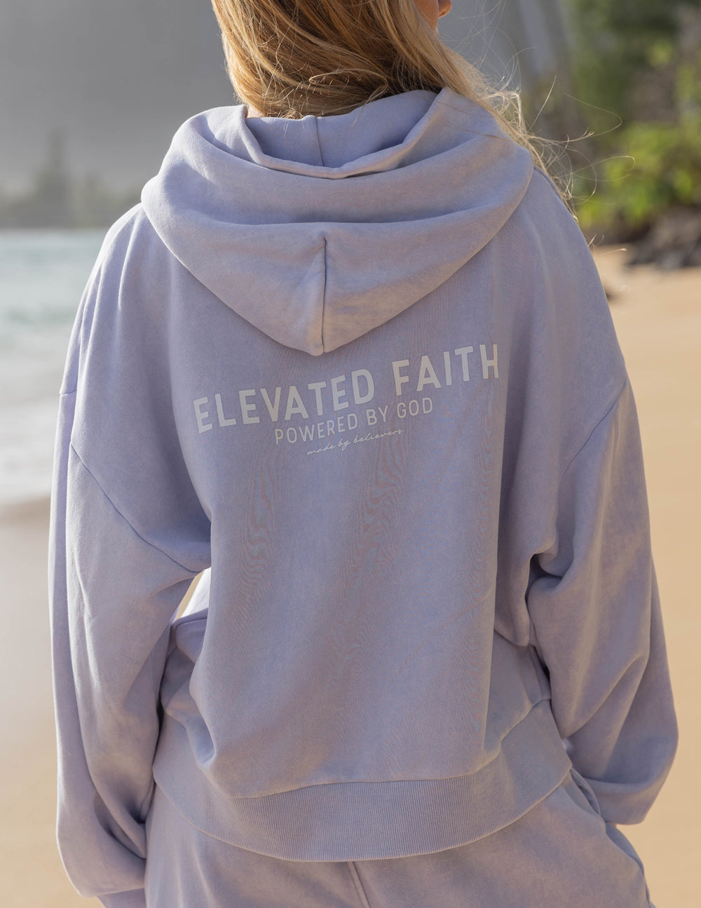 Lavender full-zip hoodie with ELEVATED FAITH back print and drawstring hood
