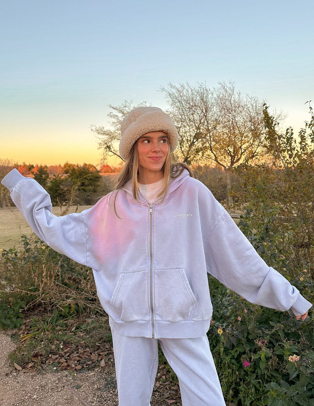 Lavender full-zip hoodie with drawstring hood and front zipper